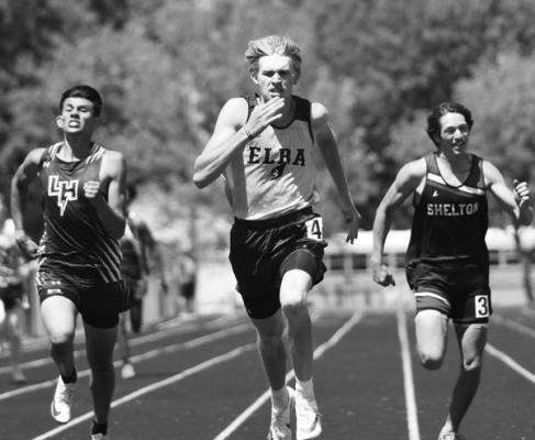 ELBA’S GARRETT KASLON paced the field of twenty-three runners in the boys’ 400-meter dash at Wednesday’s District D-5 Track Meet. Kaslon won the race in 51.80 to qualify for the state track meet. Photos by Jordan Coslor