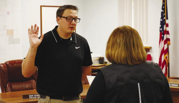 ST. PAUL Police Officer Thomas Holmes was sworn in last Wednesday, January 4th. Photo by Michael Rother