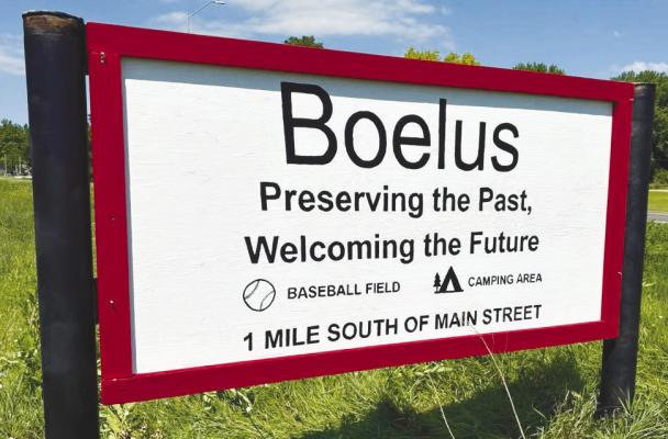A NEW WELCOME SIGN on the east side of Boelus was installed on Sunday. The effort to install a new sign was spearheaded by Amanda Bonczynski, who also painted the sign. Courtesy Photo