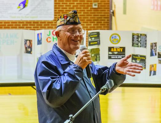 TOM SCHRODER, a United States Army veteran, was the guest speaker at Friday’s Veterans Day program in Elba. Schroder said that, initially, he had planned to write a speech, but chose a more “interactive” approach to the presentation. (Courtney Leth)