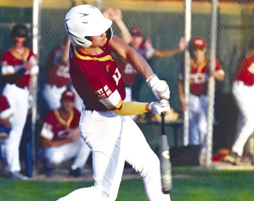 DANNEBROG-CAIRO-BOELUS’S Mason Gorecki makes contact during the first game of the Area 6 Tournament on Friday night in St. Paul. Photo by Michael Happ
