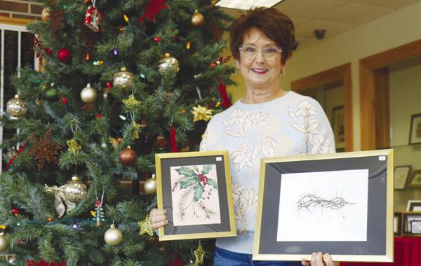 ST. PAUL artist Mary Jo Serbousek has had her watercolor paintings on display at the St. Paul Library for the past month. The vast majority of the works have been painted by the local artist during the past few months. Photo by Michael Rother