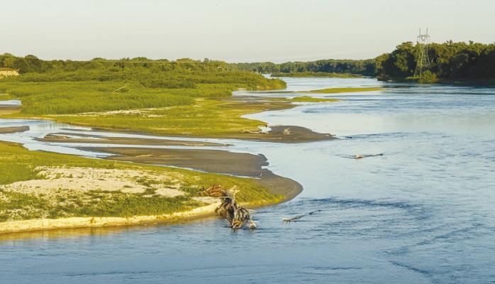 THE LOUP RIVER, pictured north of Palmer, was one of the many rivers and tributaries in the Lower Loup Basin that has benefited from a wet summer in central Nebraska. Photo by Michael Happ