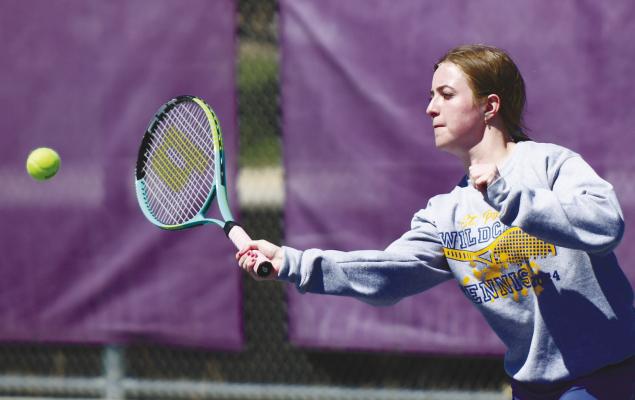 KATELYNN ALBERS attempts a pass during last Tuesday’s second singles match against Holdrege. Albers and her partner, Addison Brown, fell to the Dusters’ second duo 8-0. Photos by Jordan Coslor