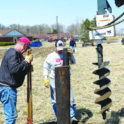 LENDING A HAND constructing the fence at the St. Paul Rotary Club’s community garden earlier this month were Fred Meyer, Dave Harrington, and Dave Brehm. (Courtesy Photo)
