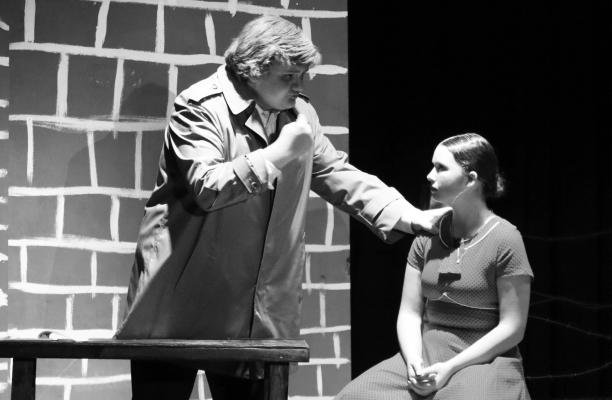 DAIMLER (Jesse Mills), a journalist with his own ties to the Nazi’s concentration camps, forces Greta (Shia Rasmussen) to confront the nature of her actions in Elba’s production of Dark Road during Blue Jay Fest on November 15th. The mid-November performance was the Bluejay outfit’s first staging of the play. Photos by Michael Rother