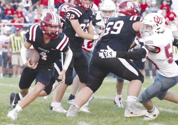 CENTURA Quarterback Wyatt Dvorak skirts past Amherst’s defense on his way upfield last Thursday night. Dvorak rushed for twenty-four yards in Centura’s loss to the Broncos. Photo by Michael Happ
