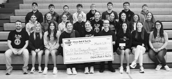 MEMBERS of the St. Paul Interact Club recently donated $750 to the St. Paul Public Schools Backpack Program. The club donated the funds it had raised on Thursday, March 5th. Courtesy Photo