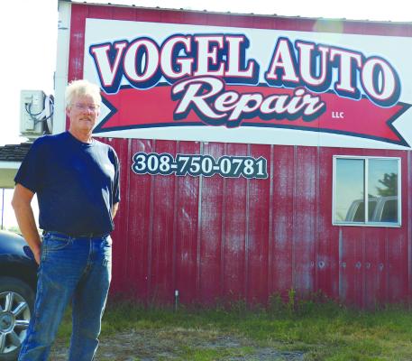 JEFF VOGEL, who has owned and operated Vogel Auto Repair for eight years, gave over operations at 101 Custer Street to longtime employee Jason Leth this week. Photo by Michael Rother