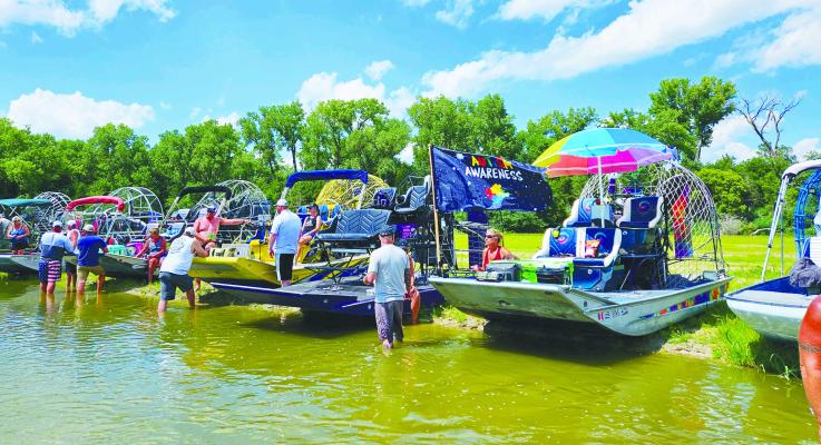 AROUND FIFTY BOATS participated in last weekend’s Nebraska Airboaters for Autism Awareness Fun Run, which took place along the Middle Loup River south of St. Paul. Courtesy Photo