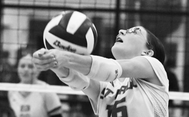 ST. PAUL’S LAYTON LUKASIEWICZ passes the ball during the third set of last Tuesday’s match between the Wildcats and the Central City Bison. Photos by Michael Happ