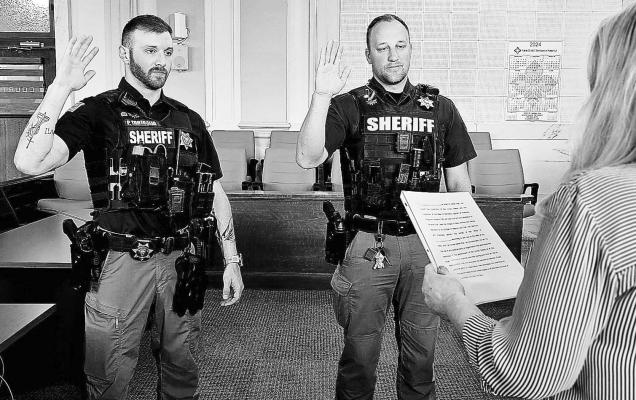 TWO DEPUTIES with the Howard County Sheriff’s Office were promoted on May 28th. Deputy Paul Tartaglia was promoted to sergeant and Corporal Trev Sharman was promoted to chief deputy. Howard County District Court Clerk Lisa Johnson swore in the deputies on Thursday, May 29, 2024. Courtesy Photo
