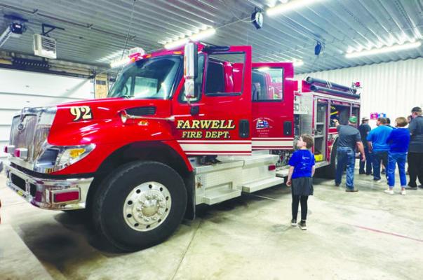 THE FARWELL VOLUNTEER FIRE DEPARTMENT had a chance to show off its new fire engine during the department’s annual fundraiser in November. The local fire department aquired the new engine in September. Courtesy Photos
