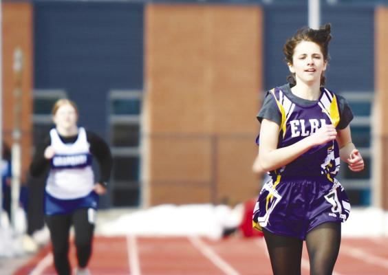 ELBA’S ALANA BERNEY finished the girls’ 400-meter dash in the shadow of the medals at last week’s Dick O’Neill Memorial Invite at Kearney High School. Berney placed eleventh in the field of thirty-one. Photo by Jordan Coslor