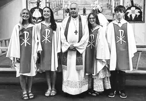 CONFIRMATION was celebrated at Christ Lutheran Church in St. Paul on Sunday, April 27th. Pictured following the service are Jillian Wells, Addilyn Platek, Reverend John Doolittle, Harleigh Boroff, and Devin Meyer. Courtesy Photo