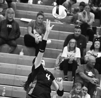 ST. PAUL’S AUBREE FITZGERALD goes for a kill from the left pin during last Tuesday’s match with Adams Central. Photo by Michael Happ