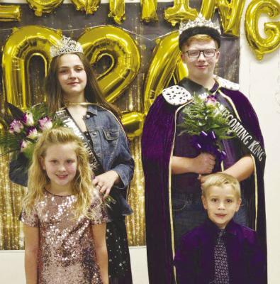ELBA HIGH SCHOOL observed homecoming on Friday, October 4th with multiple activities. This year’s homecoming royalty were crowned during a special ceremony at the Elba Community Center on Friday. Raven Lewis and Trevon Rasmussen were crowned this year’s king and queen. They are pictured with attendants Tyne Polski and Cody Donscheski. Courtesy Photo