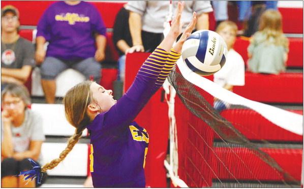 ELBA’S MAYCEE RADKE picks up a block during the Bluejays’ battle with High Plains Community on Saturday afternoon at the Heartland Lutheran volleyball tournament. The Bluejays fell to the Storm during the tournament’s second match. Photos by Josh Salmon