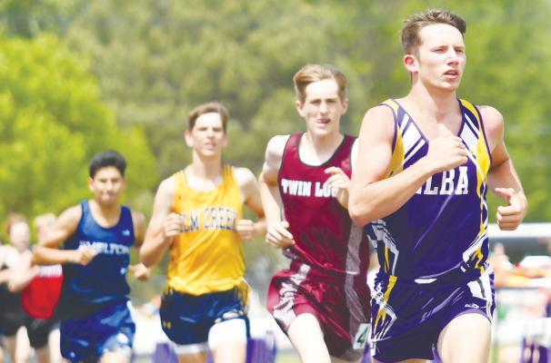 ELBA’S BLAKE BARG claimed his spot in the NSAA State Track and Field Championships by winning a gold medal in the two-mile run at the District D-5 Meet in Burwell last Wednesday. Photo by Jordan Coslor