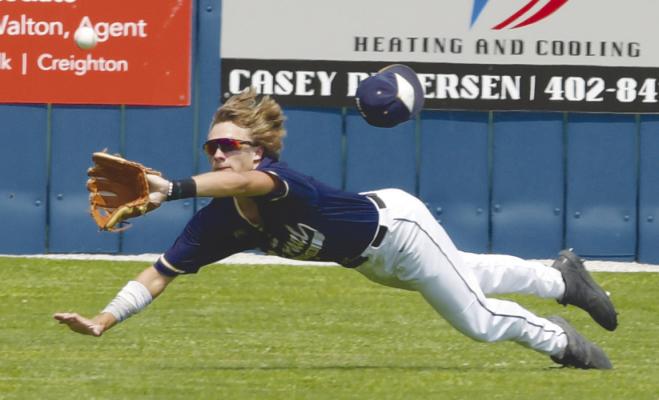 ST. PAUL right fielder Mason Majerus makes a diving catch for the final out of the first inning of last Saturday’s game against Pender at the Class C American Legion State Baseball Tournament. Photo by Michael Happ