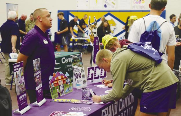 STUDENTS from St. Paul, Elba, and Centura public schools had the chance to visit with representatives from multiple colleges and universities, including Grand Canyon University, during last week’s career fair at St. Paul Public Schools. Photo by Michael Rother