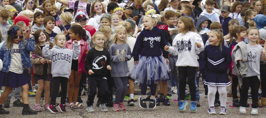 CENTRAL VALLEY ELEMENTARY STUDENTS danced with excitement during the Central Valley Public Schools homecoming pep rally on main street in Wolbach on Friday afternoon. Photos by Michael Rother