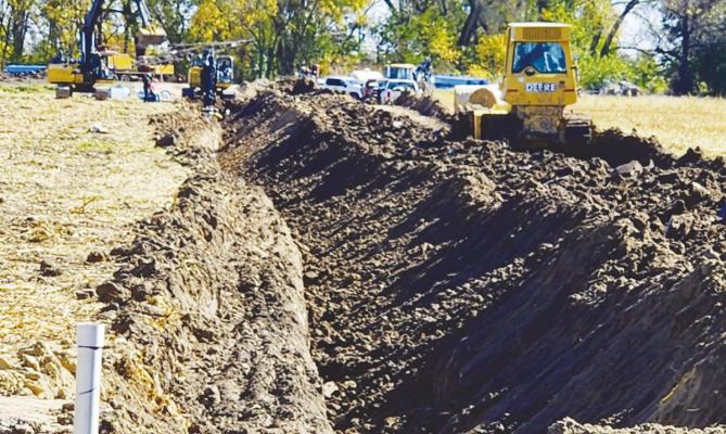 THE FARWELL IRRIGATION DISTRICT is in the final stages of completing the installation of about 3.1 miles of buried laterals, and four pump plants, between Dannebrog and St. Paul. Pictured is work from an early stage of the project. Courtesy Photos
