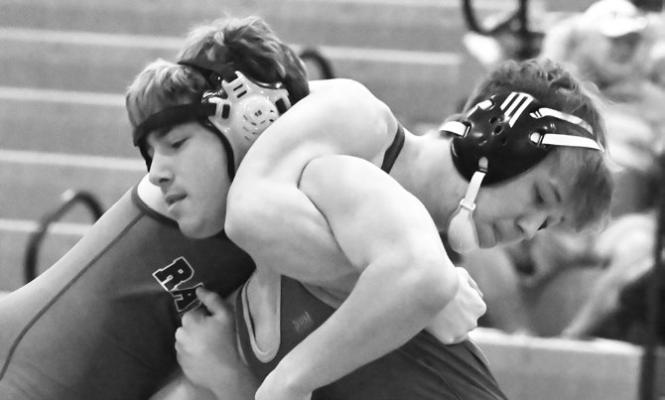 CENTURA’S MATTHEW MAGANA went toe-to-toe with Ravenna’s Logan Spotanski during the Centurions’ dual against the Bluejays in Loup City last Thursday night. Spotanski won the match with a first period pin. Photos by Michael Happ