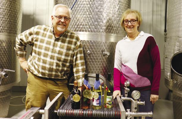 MICK AND LORETTA MCDOWELL show off their award-winning wines at their winery north of St. Paul. Four of the central Nebraska winery’s wines—Elephant Ear Red, Legacy, Frosty, and Vacation—earned accolades at the fourth annual Los Angeles Invitational Wine &amp; Spirits Challenge. Photo by Michael Rother