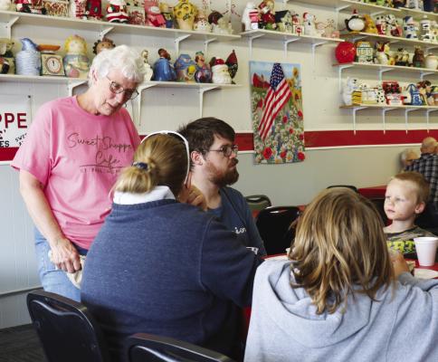 CUSTOMERS of all ages attended last week’s event at the Sweet Shoppe in St. Paul. The event served as an anniversary celebration for owner Alice Osterman-Davis, a farewell party, and a meet-and-greet for the establishment’s new owners. (Michael Rother)