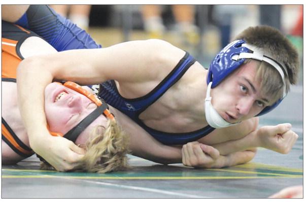 DERRICK RUZICKA pinned Palmer’s Kane Kucera late in the quarterfinal match at 120-pounds on Saturday. Ruzicka placed second at the Central City Invite last week. Photos by Michael Happ