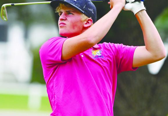 BEAU PARO watches his tee shot from the seventeenth tee box during the second round of the NSAA Class C State Golf Championships at Indianhead Golf Club in Grand Island on Thursday. Paro placed thirteenth in last week’s tournament. Photos by Michael Happ