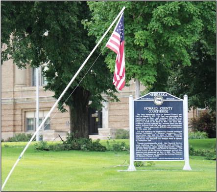 OLD GLORYwas hanging at a nearly forty-five degree angle after a severe storm swept through St. Paul last month. The storm caused extensive damage to the ten flagpoles that line Indian Street in front of the Howard County Courthouse. (Michael Happ)