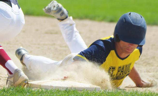 ST. PAUL’S ASHTON MEINECKE avoids getting picked off at first base during last week’s game between the St. Paul Seniors and the team from Dannebrog-Cairo-Boelus. (Michael Happ)