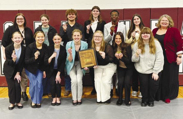 CENTURA HIGH SCHOOL speech team members showed off their conference plaque last week. Members pictured include (back row): Assistant Coach Sophie Reeves, Lilly Lehman, Gavin Whitefoot, David Hadenfeldt, Ian Kapundu, Dottie Robertson, and Coach Kris Simon; (front row): Karsyn Lemburg, Ella Simon, Lauren Suntych, Hope McDonald, Brionna Lowe, Shiloh Smith, and Regan Widholm. Courtesy Photo