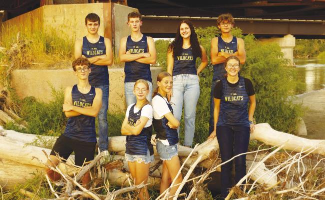 ST. PAUL CROSS COUNTRY: Members of the St. Paul High School cross country team include (back row): Eli Sladek, Aiden Lukasiewicz, Katie Kleinsasser, and Tate Busch; (front row): Lorenzo Giarnetti, Braelyn Muller, Autumn Doncheski, and Julia Kleinsasser. Photo courtesy of Misty Evers Photography