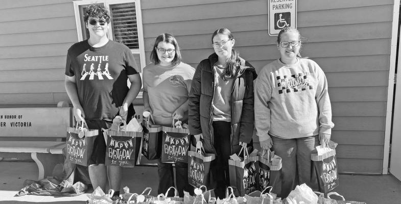 THE ST. PAUL HIGH SCHOOL FCCLA Chapter recently donated Birthday Bags to the Howard Greeley County Food Pantry. The bags contain a cake mix, frosting, candles, decorations, and party favors. Chapter members present for the donation included President Josef Kaslon, Secretary Eviie Olinger, Treasurer Taelyn McClay, and Vice President Karina Smydra. Courtesy Photo