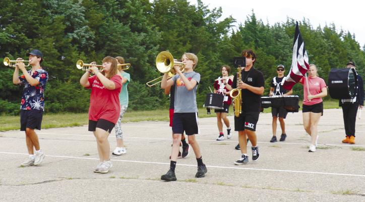 MEMBERS of the Centura High School Marching Band practice their parade formation in the parking lot of the school on Friday morning. Centura students participated in band camp from Tuesday until Friday of last week. Courtesy Photo