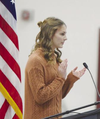 CENTURA Student Council President Katie Hadenfeldt applauds after veterans in attendance for last Thursday’s program were recognized.