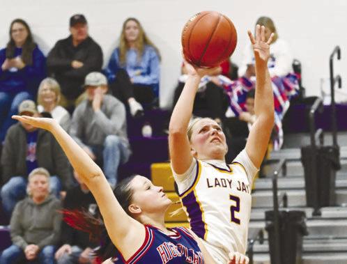 ELBA’S ADDISON WYSOCKI goes for a breakaway basket during the Bluejays’ game against High Plains last week. Wysocki led all players with sixteen points in the contest. Photo by Michael Happ