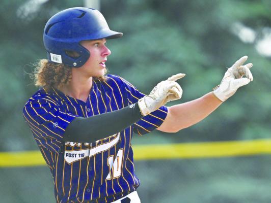 ZANDYN WELLER celebrates after hitting a triple during last week’s game against Kearney Jersey’s. Weller’s hit would help increase St. Paul’s lead to 6-3, with the locals winning the game 10-7. Photo by Michael Happ