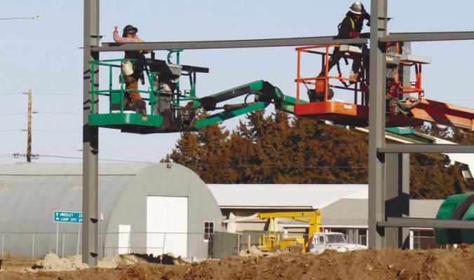 THE FUTURE HOME of St. Paul’s grocery store—Home Plate Market—went vertical on Wednesday, January 7, 2026. The project, which broke ground last fall, had been expected to be completed in ten to twelve months. Photos by Michael Rother
