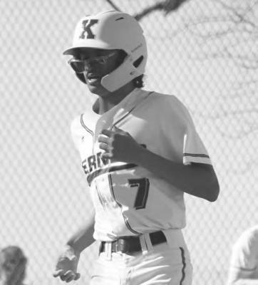 CENTRAL CITY/CENTURA’S SPENSIR JAROS crosses home plate in the first inning for the Kernels’ first run of the season last Friday against Raymond Central.