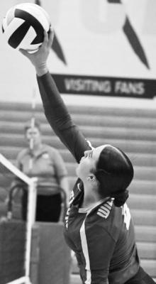 ST. PAUL’S ADDILYN PLATEK goes for a kill from the left pin last Thursday. Platek had seven of St. Paul’s thirty kills last week. Photo by Michael Happ