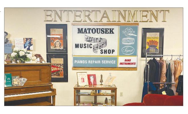 THE FORMER MATOUSEK MUSIC SHOP SIGN was put on display in the Schubert-Nielsen Exhibit Hall at the Howard County Historical Village late last week. The sign had been a fixture on Howard Avenue in St. Paul for decades. Courtesy Photo