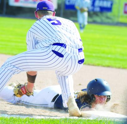 ZANDYN WELLER beats the throw to first base during Sunday afternoon’s game between St. Paul and Battle Creek in the Area B-5 Tournament. Photo by Michael Happ