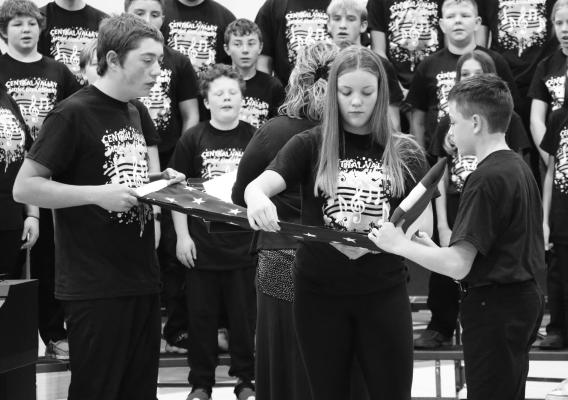 AUSTIN DUSH, PAYTON KNISS, AND DALTON DUGAN performed the folding of the flag during Friday’s Veterans Day ceremony at Central Valley Public Schools in Greeley. Photos by Michael Rother