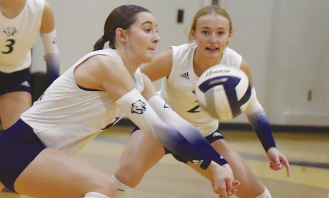 BENTLEIGH DUGAN digs up a shot from Sumner-Eddyville-Miller in the first set of last Tuesday’s Subdistrict D2-7 Tournament championship game at Central Valley High School in Greeley. Photos by Michael Happ