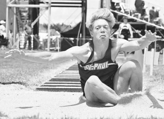 ST. PAUL’S CONNER DOUTHIT landed at 43-11 to win the boys’ triple jump at the District C-7 Track Meet at Wood River Rural High School last week. With the win, Douthit claimed a new personal best and a spot at the state track meet. Photos by Michael Happ
