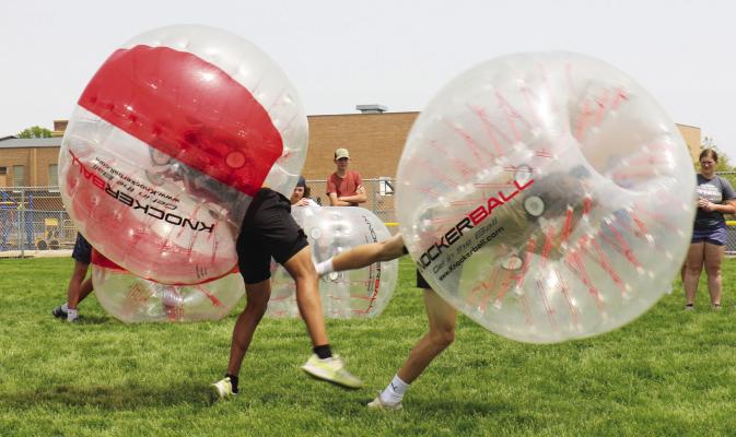 ST. PAUL PUBLIC SCHOOLS students battle in a game of Bubble Ball during last week’s Makers’ Fair. The event, which is held in odd-numbered years, featured a wide variety of activities and educational programs. (Michael Rother)